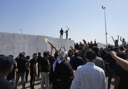 15 Dead As Followers Of Iraqi Shiite Cleric Storm Government Palace