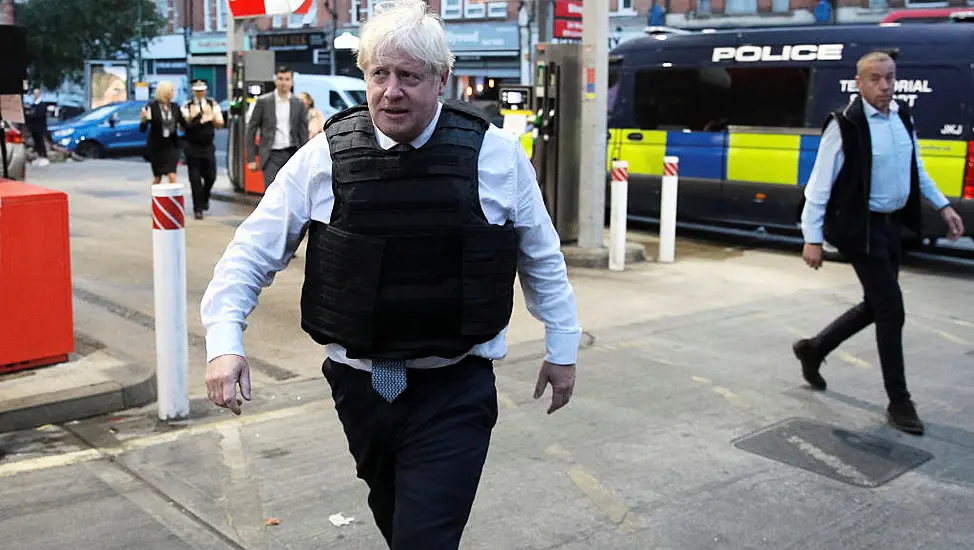 Video Appears To Capture Johnson Taking Part And Speaking To Man In Police Raid