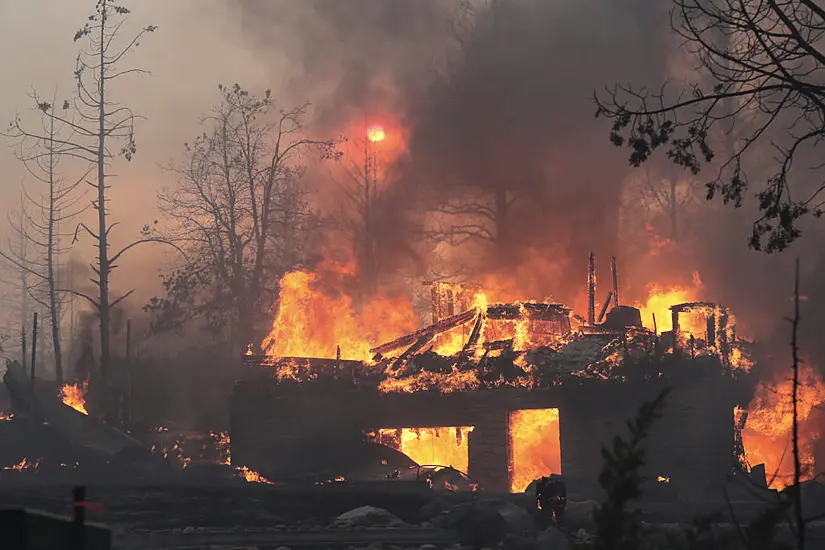 California Wildfire Destroys Around 100 Homes