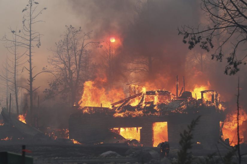California Wildfire Destroys Around 100 Homes