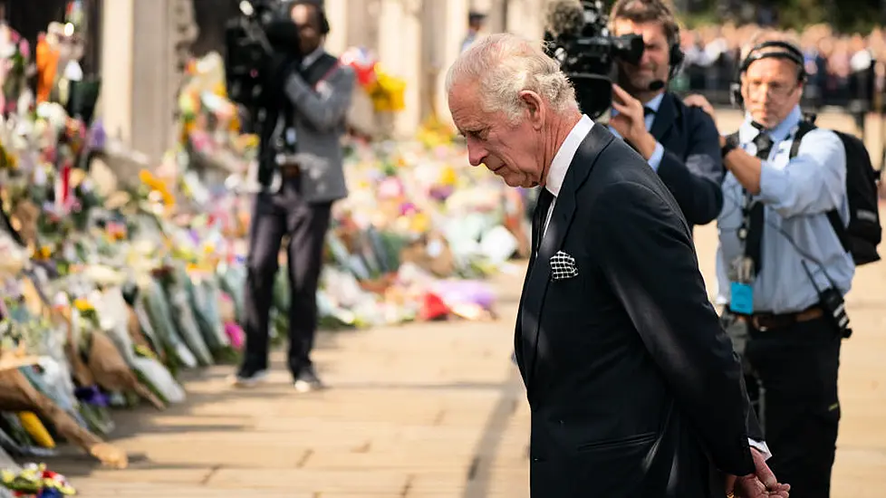 King Charles Greets Crowds On Arrival At Buckingham Palace