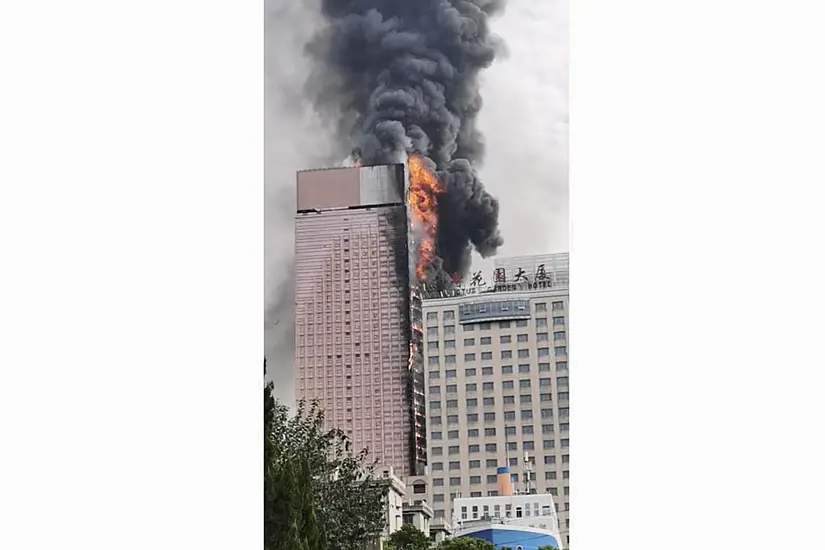 Fire Engulfs 42-Storey Building In China