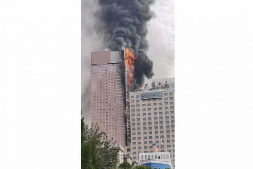Fire Engulfs 42-Storey Building In China