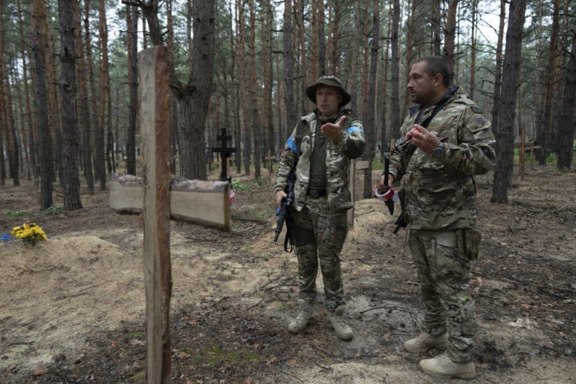 Mass Burial Site Includes Torture Victims, Says Ukraine’s President