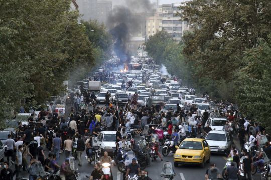 At Least Nine Killed As Iran Protests Spread Over Woman’s Death