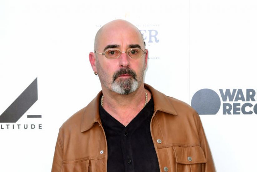 Former Oasis Guitarist Bonehead Says His Tonsil Cancer Has ‘Gone’