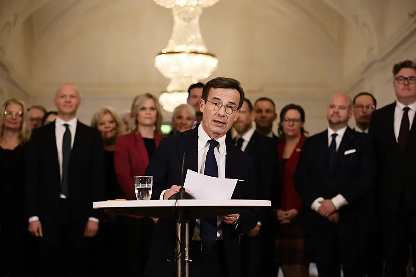 New Swedish Pm Presents Three-Party Centre-Right Government