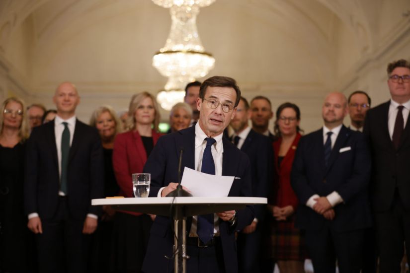 New Swedish Pm Presents Three-Party Centre-Right Government