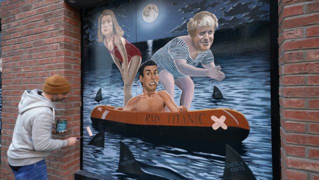 Sharks Circle British Prime Minister In New Belfast Mural
