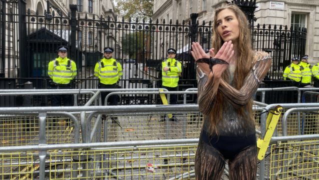 Activist Marches Through London In Almost Nothing But Paint In Bid To Save Birds