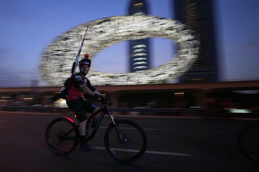 Tens Of Thousands Of Cyclists Ride On Skyscraper-Lined Superhighway In Dubai