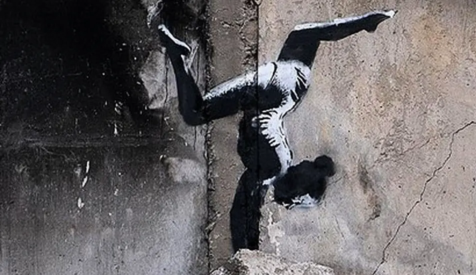 Banksy Reveals Artwork On Side Of Damaged Building In Ukraine