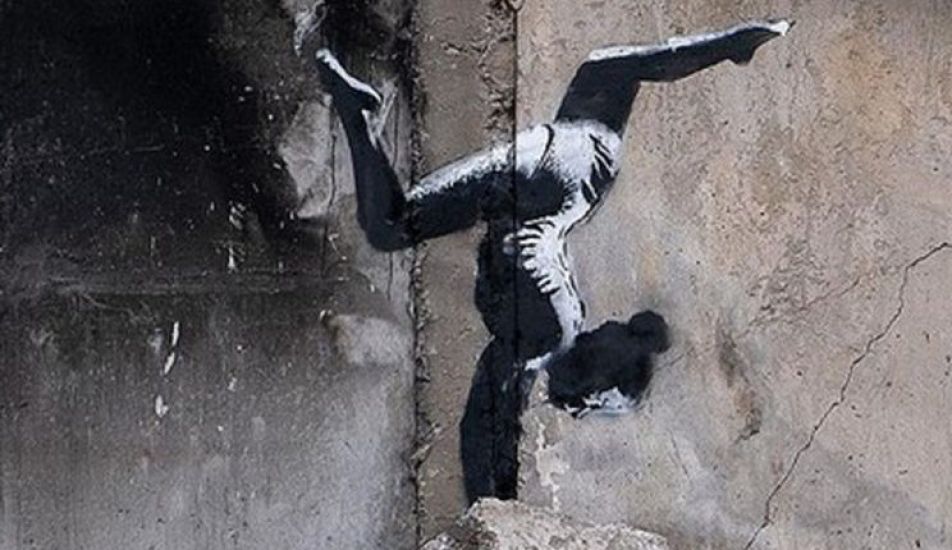 Banksy Reveals Artwork On Side Of Damaged Building In Ukraine