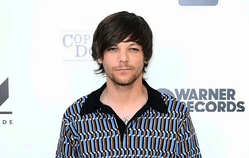 Louis Tomlinson Forced To Reschedule Events After Breaking Arm In Fall