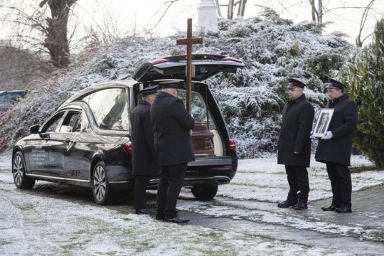 Funeral Held For First Of Two Poles Killed In Missile Blast