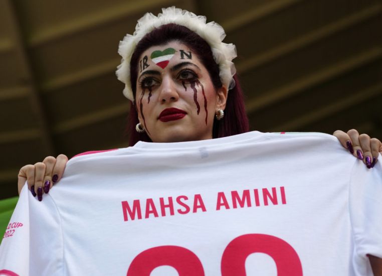 Iran Regime Supporters Confront Protesters Ahead Of World Cup Game Against Wales