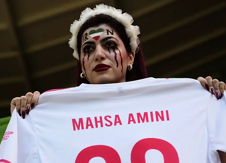 Iran Regime Supporters Confront Protesters Ahead Of World Cup Game Against Wales