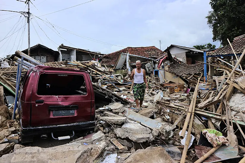 Indonesia Earthquake Toll Reaches 310 As More Bodies Are Found