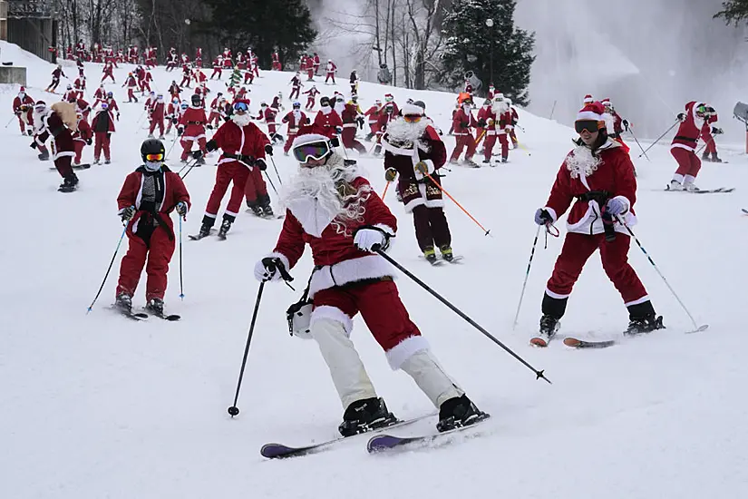 300 Skiing Santas, A Grinch And A Tree Take To Slopes To Spread Christmas Cheer