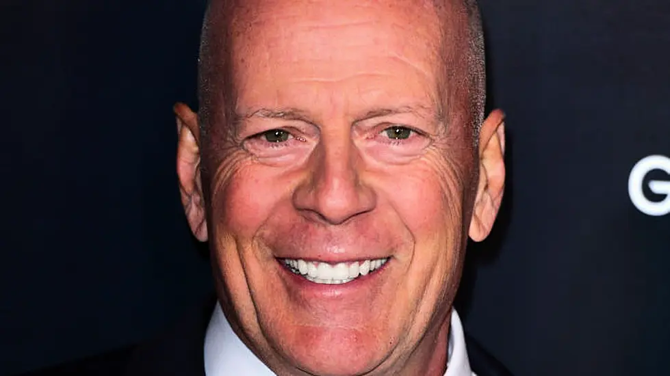 Bruce Willis Cuddles Puppy In First Family Photos Since Retirement Due To Health