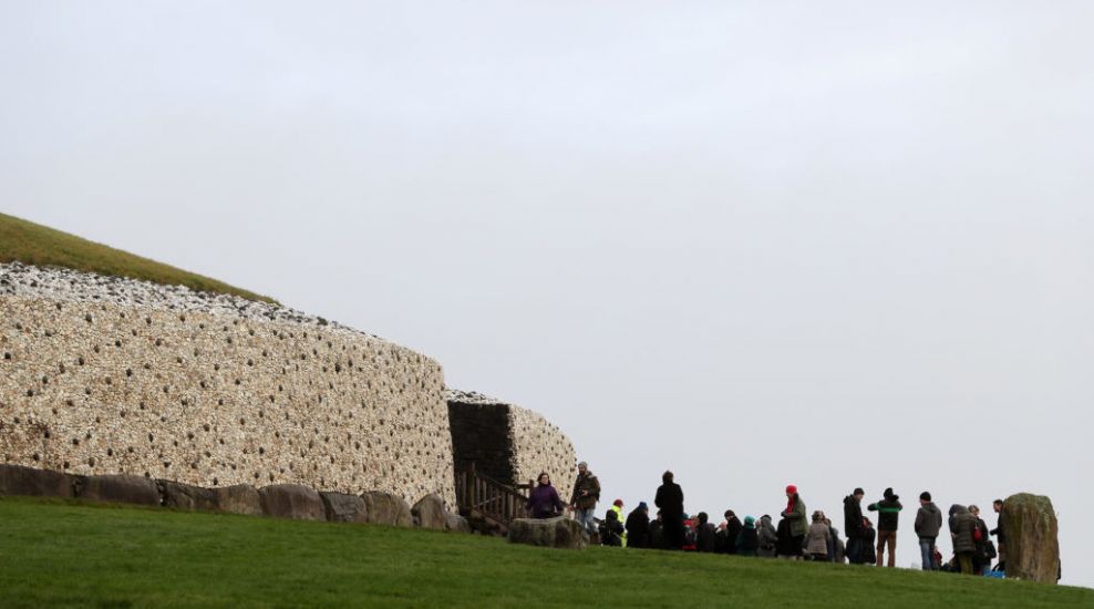 Newgrange Illuminated As Public Gather To Celebrate Winter Solstice