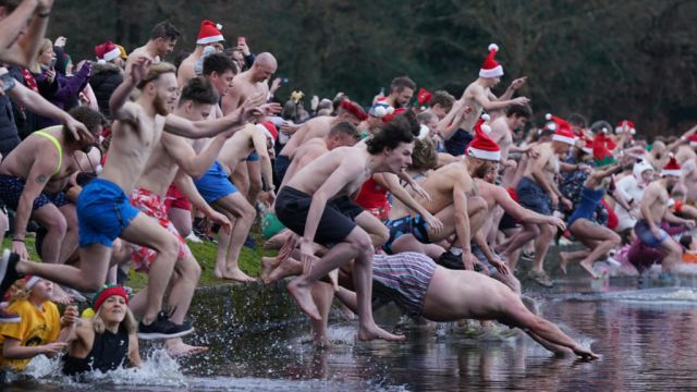 Ho, Ho, Ho That’s Cold: Swimmers Mark Christmas Day With Bracing Dips