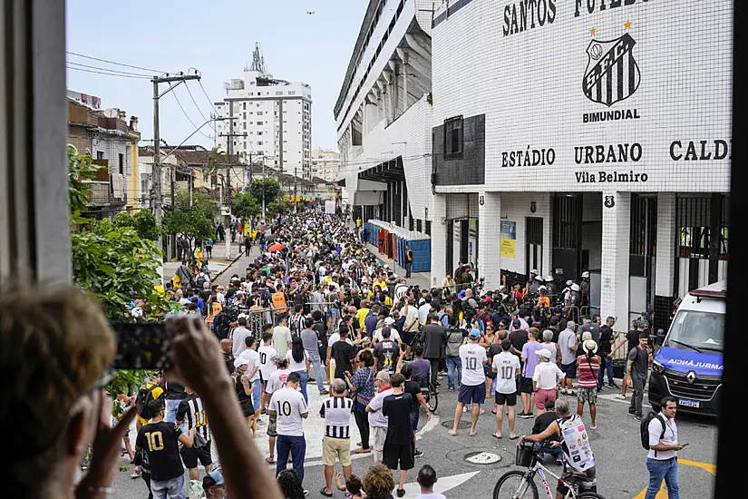 Fans Mourn Pele At Public Viewing In Brazil Stadium