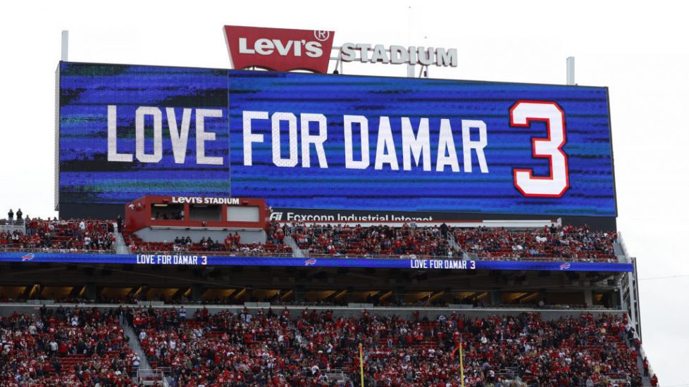 Damar Hamlin Remains In Hospital But ‘Is In Good Spirits’ After Cardiac Arrest