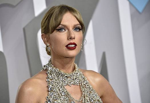 Taylor Swift’s Guitar And Eminem’s Trainers To Be Sold At Us Charity Auction