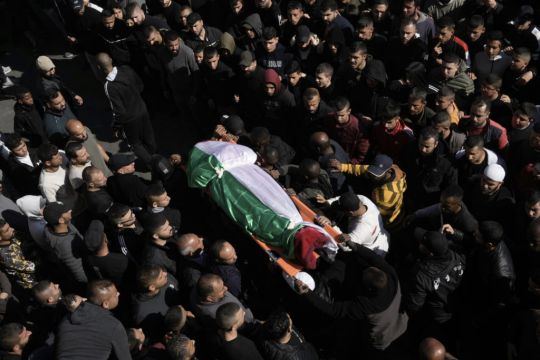 Palestinians Bury Dead As Risk Of Flare-Up Ebbs After Israeli Raid