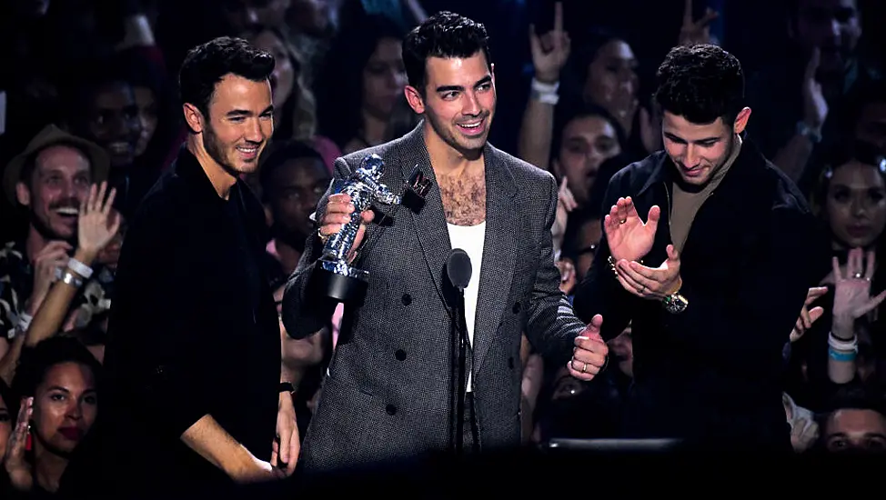 Jonas Brothers Announce New Album Release Date And Tour At Walk Of Fame Ceremony