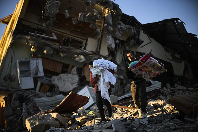 Rescuers Pull More Survivors From Earthquake Wreckage