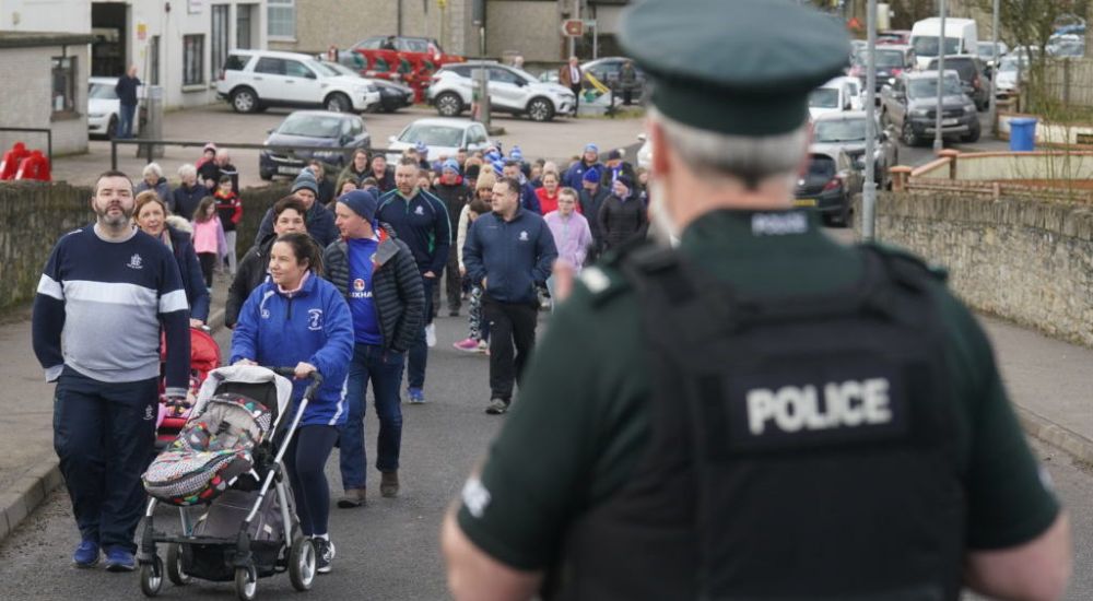Football Club Leads Solidarity March For Shot Psni Officer