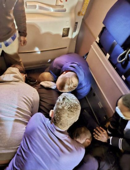 Passengers ‘Worked Together To Tackle’ Man Who Tried To Open Plane Door