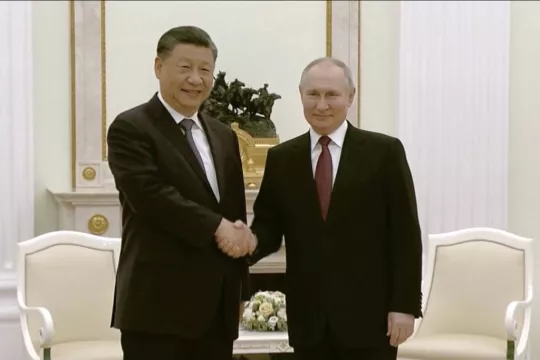 Putin Welcomes China's Xi And Hails Plan To Settle 'Acute Crisis' In Ukraine