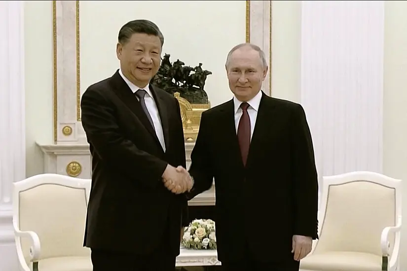 Putin Welcomes China's Xi And Hails Plan To Settle 'Acute Crisis' In Ukraine