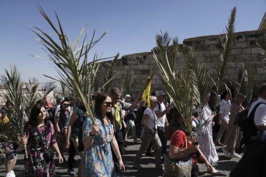 Christian Faithful Mark Palm Sunday In Jerusalem