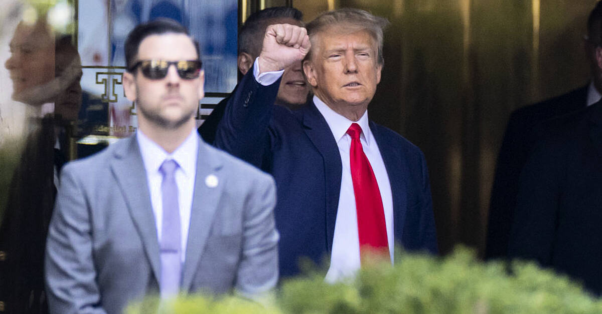 Trump surrenders to New York authorities ahead of arraignment