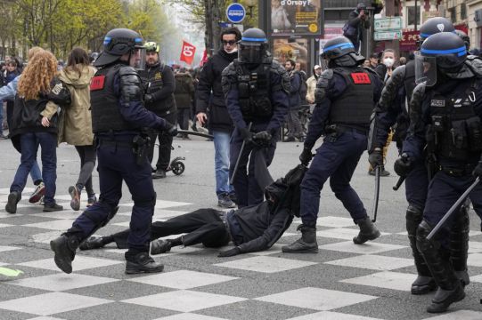 French Police Fire Tear Gas At Protesters Amid New Strikes Over Pension Reforms
