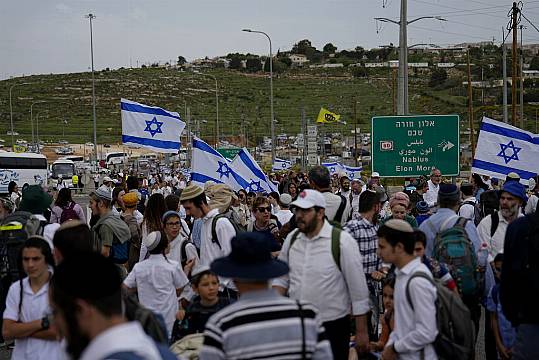 Defiant Jewish Settlers March To Evacuated West Bank Outpost