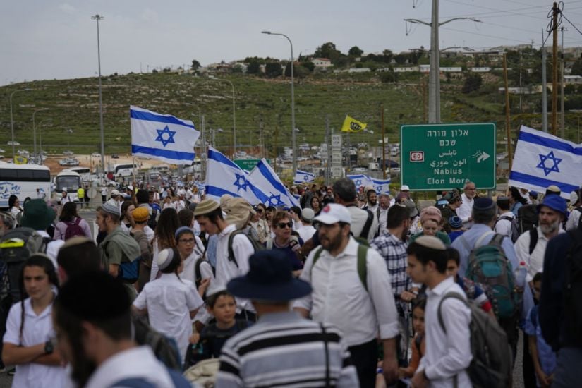 Defiant Jewish Settlers March To Evacuated West Bank Outpost