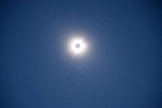 Thousands Gather To Enjoy Spectacle Of Rare Hybrid Solar Eclipse