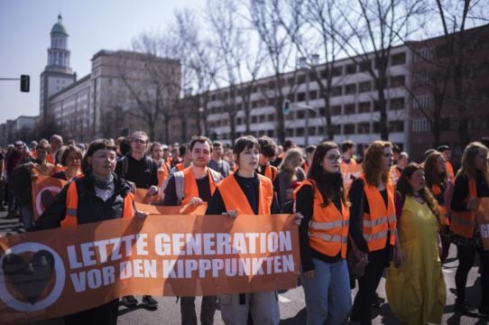 Climate Activists Stage Slow March Through German Capital