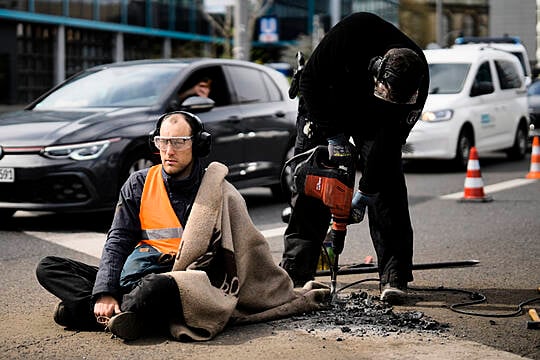 Climate Protesters Attempt To Halt Traffic In Berlin