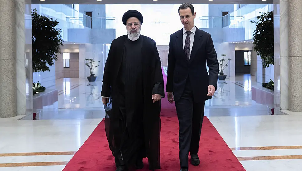 Iranian President Holds Rare Meeting With Assad In Syria