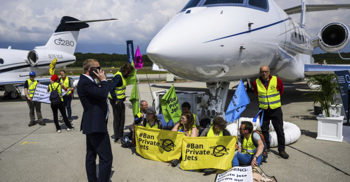 Geneva airport briefly closed as activists protest against private jet fair