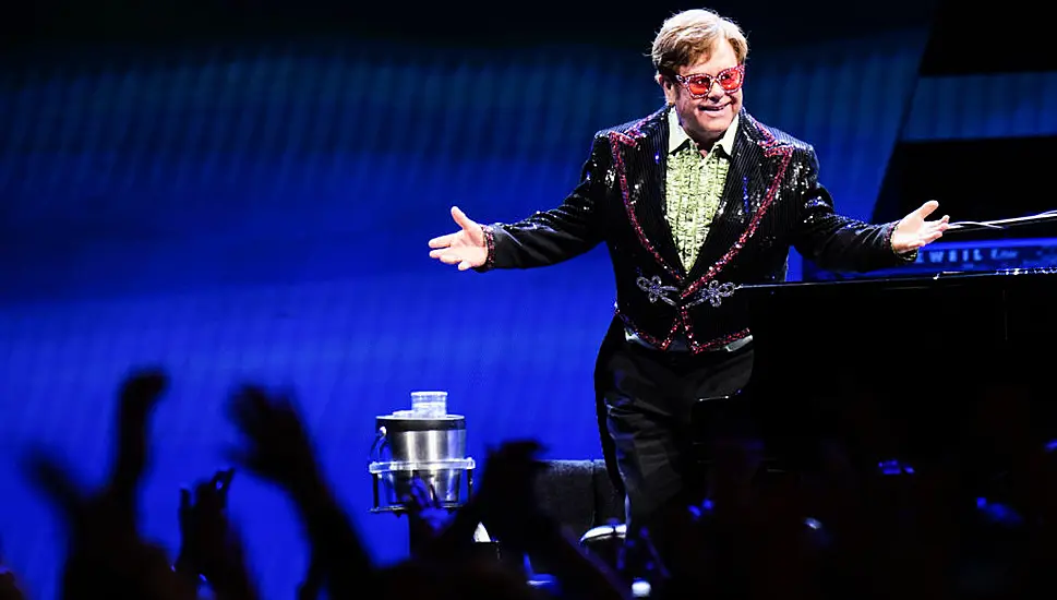 Elton John Greets Manchester City’s Fa Cup Winners At Airport