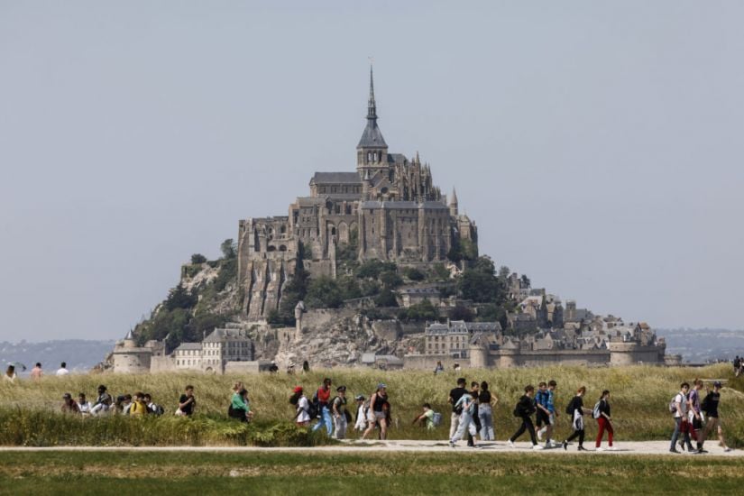 Landmark Abbey Mont-Saint-Michel Celebrates 1,000Th Birthday With Macron Visit