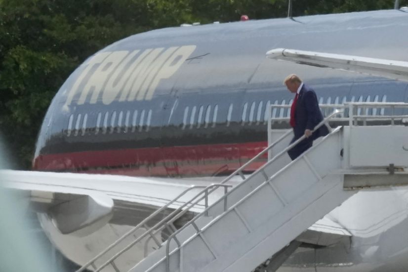 Donald Trump Arrives In Florida As History-Making Court Appearance Approaches