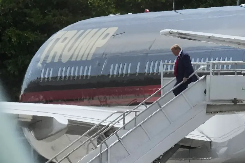 Donald Trump Arrives In Florida As History-Making Court Appearance Approaches